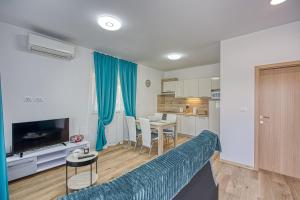 אזור ישיבה ב-Apartment Porec-Jug