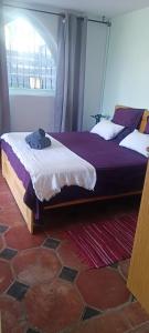 Posteľ alebo postele v izbe v ubytovaní Les jardins d'Agadir
