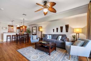 a living room with a couch and a table at Waikoloa Beach Villas L3 in Waikoloa