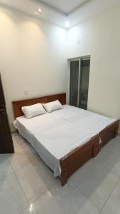 Katil atau katil-katil dalam bilik di Continental Boys Hostel R-2 Johar Town