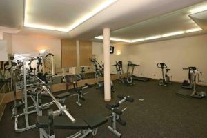 a gym with many exercise bikes in a room at Hotel Maggi in Rogoźno