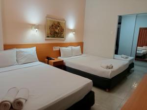 Hotel Atlântico Tower客房内的一张或多张床位