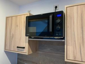 TV a/nebo společenská místnost v ubytování Haus Rosa