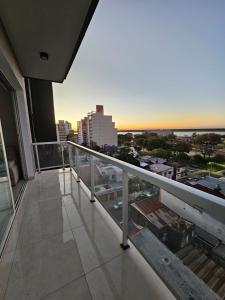 a balcony with a view of a city at Rio Parana alta Vista in Corrientes