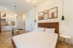 Katil atau katil-katil dalam bilik di Idea Design Apart-Hotel Chykalenka