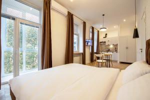 Katil atau katil-katil dalam bilik di Idea Design Apart-Hotel Chykalenka
