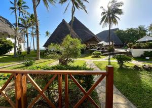 a view of a resort with palm trees at Blue Bay Village in Watamu