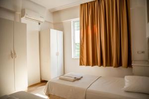 Postel nebo postele na pokoji v ubytování SARAY APART OTEL