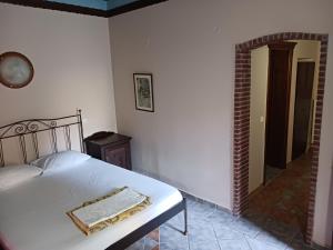 Postel nebo postele na pokoji v ubytování Hotel Nemesis