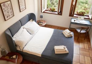 Ένα ή περισσότερα κρεβάτια σε δωμάτιο στο Cozy Duomo - Elegant & Quiet, 300m from Cathedral