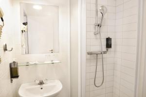 Koupelna v ubytování Fosshotel Baron