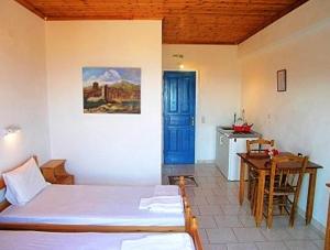 A bed or beds in a room at Climati Studios