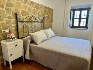 Postel nebo postele na pokoji v ubytování Casa El Chorreador