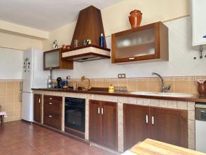 Kuchyň nebo kuchyňský kout v ubytování Casa El Chorreador