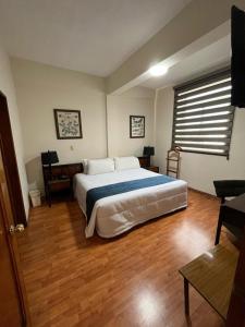 Voodi või voodid majutusasutuse HOTEL TRUEBA toas
