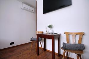 TV a/nebo společenská místnost v ubytování Penzion u Zajíčku