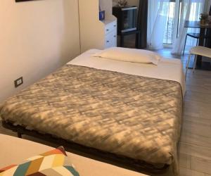 Postel nebo postele na pokoji v ubytování il Riccio B&B
