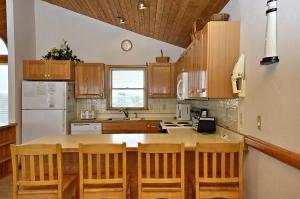 Kuchyň nebo kuchyňský kout v ubytování 2931 - Lighthouse by Resort Realty