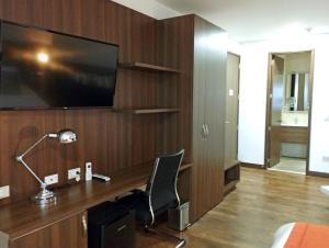 TV a/nebo společenská místnost v ubytování Hotel Royal Elim International