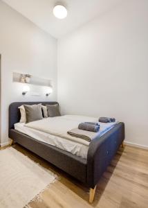 Postel nebo postele na pokoji v ubytování Natural Harmony Apartment