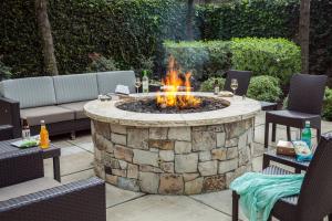a fire pit in the middle of a patio at Courtyard by Marriott Stockton in Stockton