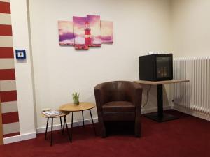 TV a/nebo společenská místnost v ubytování Hotel Mühleneck