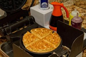 a waffle in a pan on top of a stove at Hampton Inn Morristown in Morristown