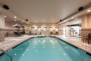 a large pool in a hotel room with at Hilton Garden Inn Columbus Edinburgh in Edinburgh