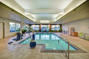 a large pool in a hotel room with at Home2 Suites by Hilton Springfield North in Springfield