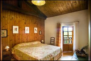 Postel nebo postele na pokoji v ubytování Agriturismo Famiglia al Castello Di Bagnolo