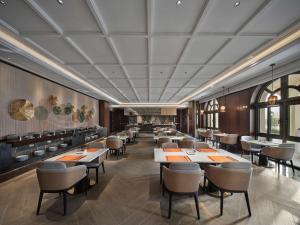 Hollick Hotel Wen'An, Tapestry Collection By Hilton tesisinde bir restoran veya yemek mekanı