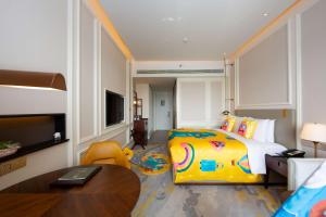 Televisi dan/atau pusat hiburan di Hollick Hotel Wen'An, Tapestry Collection By Hilton