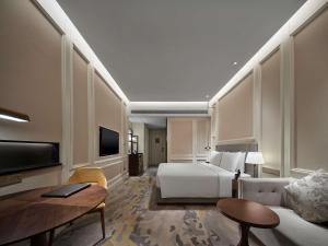 Televisi dan/atau pusat hiburan di Hollick Hotel Wen'An, Tapestry Collection By Hilton