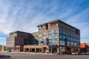 a building on the corner of a street at Homewood Suites By Hilton Albuquerque Downtown in Albuquerque