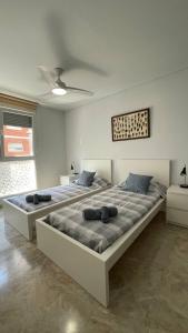 Ein Bett oder Betten in einem Zimmer der Unterkunft Preciosa a 2 min Renfe