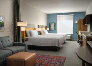 Home2 Suites By Hilton Tupelo客房内的一张或多张床位