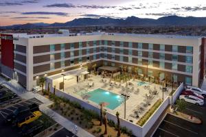 an aerial view of a hotel with a pool at Home2 Suites By Hilton Las Vegas Northwest in Las Vegas