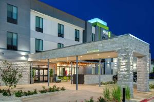 a rendering of the front of a hotel at Home2 Suites By Hilton Burleson in Burleson