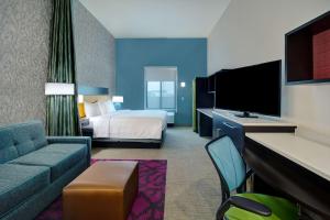 Postel nebo postele na pokoji v ubytování Home2 Suites By Hilton Burleson