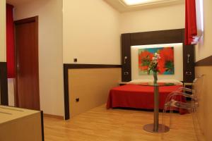 Postel nebo postele na pokoji v ubytování Hotel Louisiana