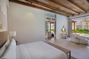 Postel nebo postele na pokoji v ubytování Maysan Doha, LXR Hotels & Resorts + 31 fotografií