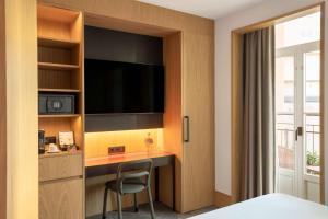 Arts Hotel Porto, Tapestry Collection By Hilton客房内的一张或多张床位