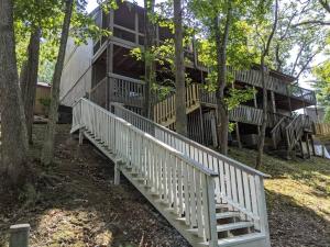 a house with stairs leading up to it at Lakeside Trail in Bella Vista