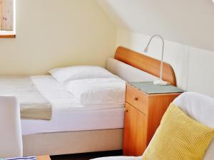 Postel nebo postele na pokoji v ubytování TAMARA dom przy Alei Gwiazd Sportu