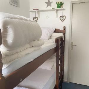 Ένα ή περισσότερα κρεβάτια σε δωμάτιο στο Pyrénées 2000 Appt 4 pers