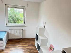 TV a/nebo společenská místnost v ubytování 4-h3rOeS Legoland Günzburg Wohnung 1