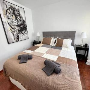 Voodi või voodid majutusasutuse Apartman Los Cristianos-Cristimar toas