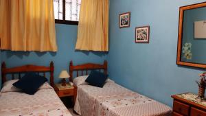 Postel nebo postele na pokoji v ubytování Summerland LC Holiday Home + 37 fotografií