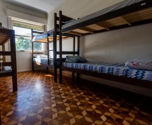 Postel nebo postele na pokoji v ubytování Hostel Capivara's Curitiba