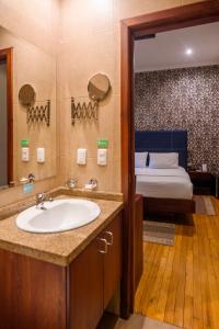 Katil atau katil-katil dalam bilik di Santa Lucia House - Forum